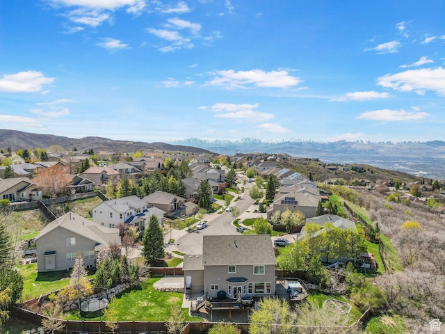 aerial perspective of suburban area featuring a mountainous background