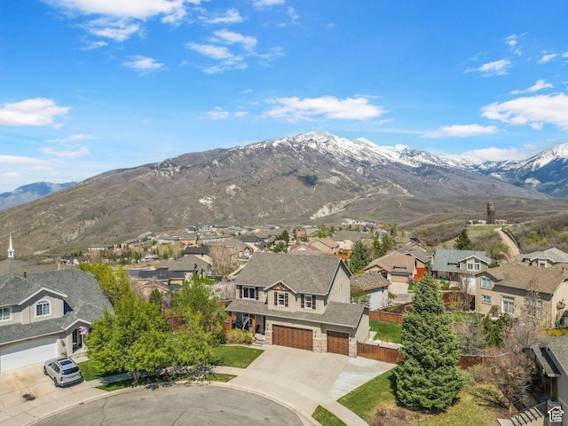 view of mountain background with nearby suburban area