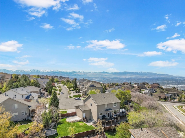 aerial perspective of suburban area featuring a mountainous background