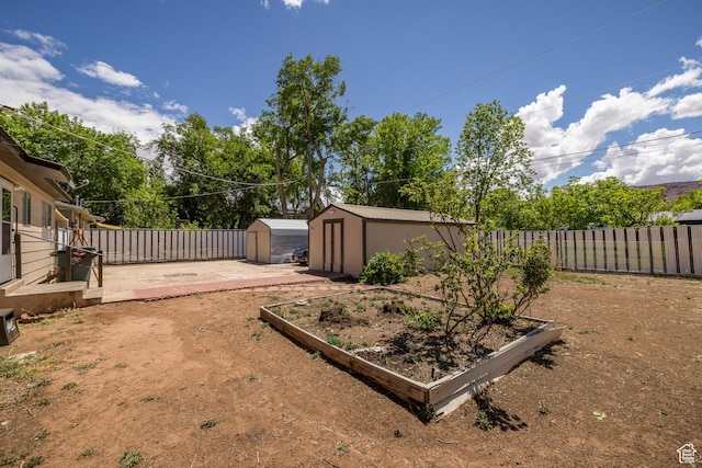 527 W Palisade Dr, Moab, UT 84532 - fenced backyard featuring a garden