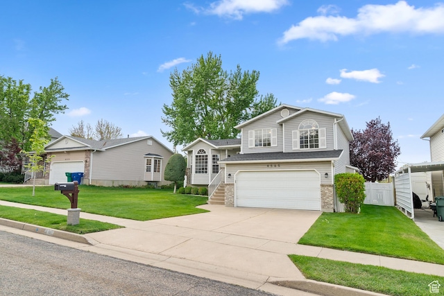 tri-level home featuring an attached garage, concrete driveway, and brick siding
