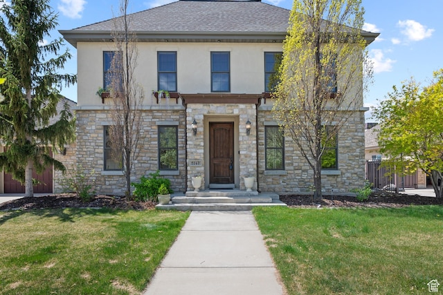view of front of home featuring stucco siding, stone siding, and a shingled roof