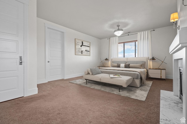 5047 N Larkwood Ln, Lehi, UT 84043 - carpeted bedroom featuring a fireplace with flush hearth and baseboards