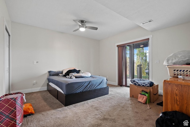 bedroom with carpet, access to exterior, baseboards, and ceiling fan