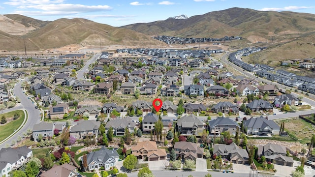 view of property location with nearby suburban area and mountains