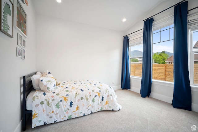 bedroom with lofted ceiling, carpet floors, baseboards, and recessed lighting