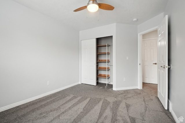 unfurnished bedroom with carpet floors, baseboards, a closet, and ceiling fan