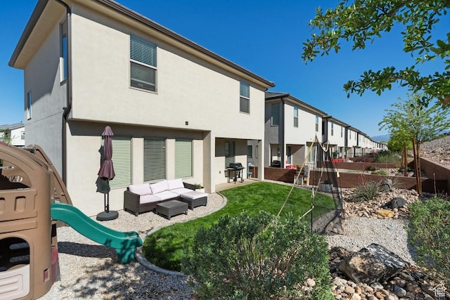 6303 S Zelda Dr, St George, UT 84790 - back of house with a residential view, stucco siding, a playground, fence, and a patio area