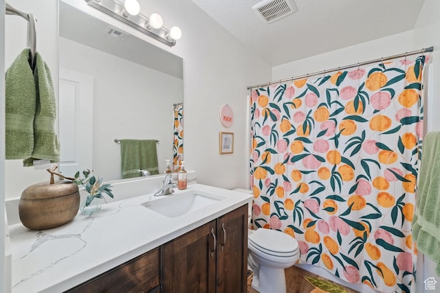 6303 S Zelda Dr, St George, UT 84790 - full bathroom featuring toilet, vanity, and curtained shower