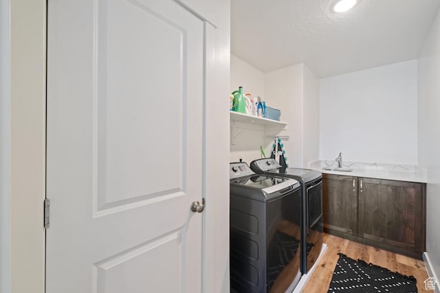 6303 S Zelda Dr, St George, UT 84790 - clothes washing area with washer and dryer and light wood-style floors