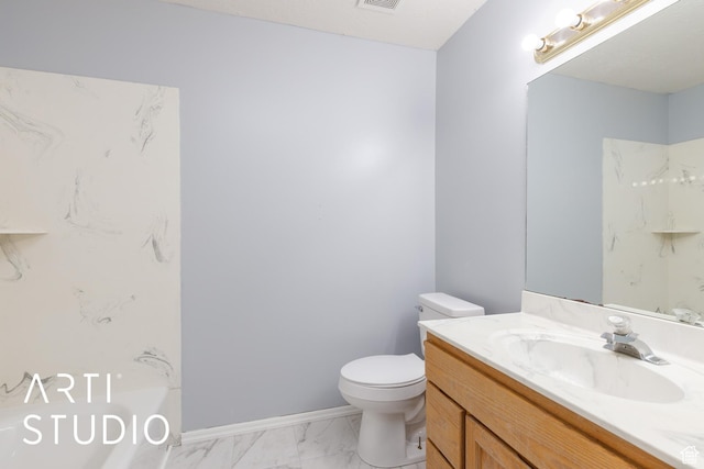 full bathroom with marble finish floors, toilet, vanity, and baseboards