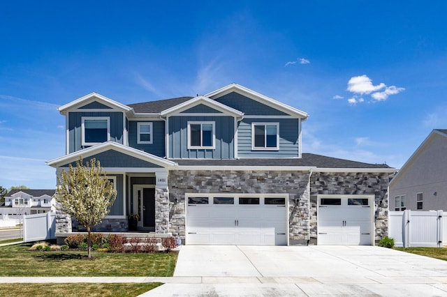 1401 S 1040 E, Heber City, UT 84032 - craftsman-style house with driveway, a garage, stone siding, a gate, and a porch