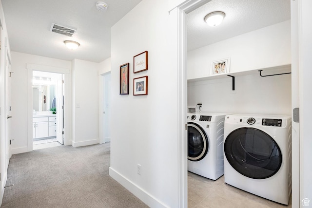 1401 S 1040 E, Heber City, UT 84032 - laundry room featuring washing machine and dryer, baseboards, and light colored carpet