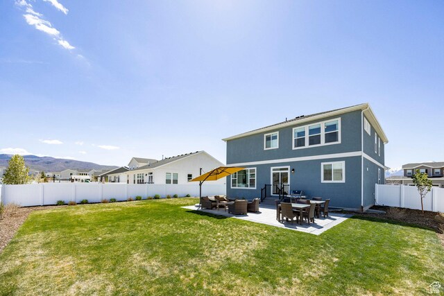 1401 S 1040 E, Heber City, UT 84032 - rear view of house featuring an outdoor living space, a patio area, a mountain view, and stucco siding