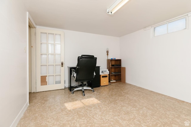 home office with tile patterned floors