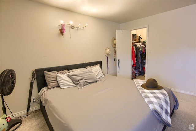 1091 Country Hills Dr Unit 306, Ogden, UT 84403 - bedroom featuring carpet, baseboards, a spacious closet, and a closet
