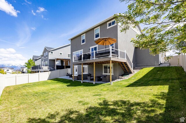 4468 W Meadow Bend Dr S, Herriman, UT 84096 - rear view of house with an outdoor living space, stucco siding, a deck, and stairway