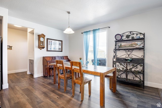 4468 W Meadow Bend Dr S, Herriman, UT 84096 - dining space with dark wood finished floors and baseboards