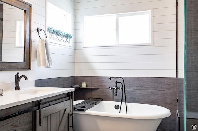 4468 W Meadow Bend Dr S, Herriman, UT 84096 - full bathroom featuring vanity and a soaking tub