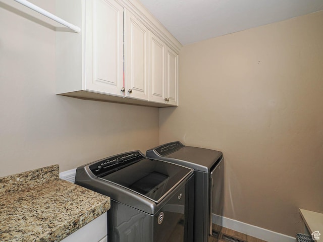 7503 S Bridge Maple Ln, West Jordan, UT 84081 - laundry area featuring cabinet space, independent washer and dryer, and baseboards