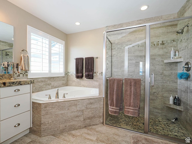 7503 S Bridge Maple Ln, West Jordan, UT 84081 - bathroom featuring a bath, vanity, a shower stall, and recessed lighting
