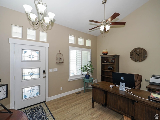 7503 S Bridge Maple Ln, West Jordan, UT 84081 - office area featuring light wood-style floors, a ceiling fan, a chandelier, a towering ceiling, and baseboards