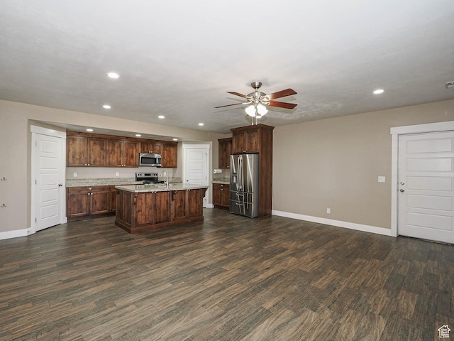 7503 S Bridge Maple Ln, West Jordan, UT 84081 - kitchen featuring appliances with stainless steel finishes, recessed lighting, a ceiling fan, baseboards, and dark wood finished floors