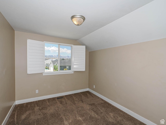 7503 S Bridge Maple Ln, West Jordan, UT 84081 - additional living space with carpet, baseboards, and lofted ceiling