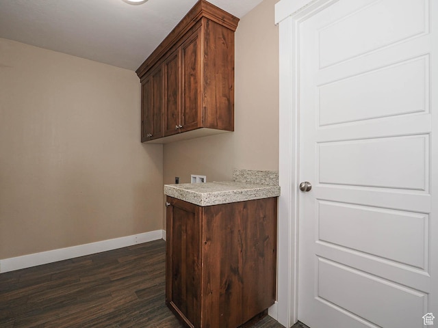 7503 S Bridge Maple Ln, West Jordan, UT 84081 - clothes washing area with dark wood-style flooring, cabinet space, baseboards, washer hookup, and electric dryer hookup