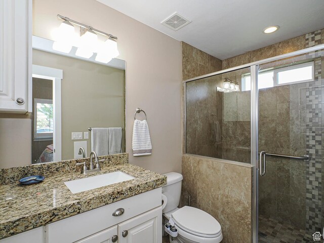 7503 S Bridge Maple Ln, West Jordan, UT 84081 - full bathroom featuring plenty of natural light, a stall shower, and toilet
