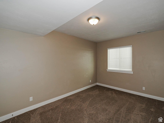 7503 S Bridge Maple Ln, West Jordan, UT 84081 - unfurnished room featuring dark carpet and baseboards