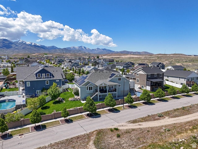 7503 S Bridge Maple Ln, West Jordan, UT 84081 - aerial perspective of suburban area with a mountainous background
