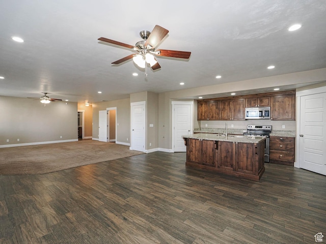 7503 S Bridge Maple Ln, West Jordan, UT 84081 - kitchen featuring appliances with stainless steel finishes, a ceiling fan, recessed lighting, and baseboards