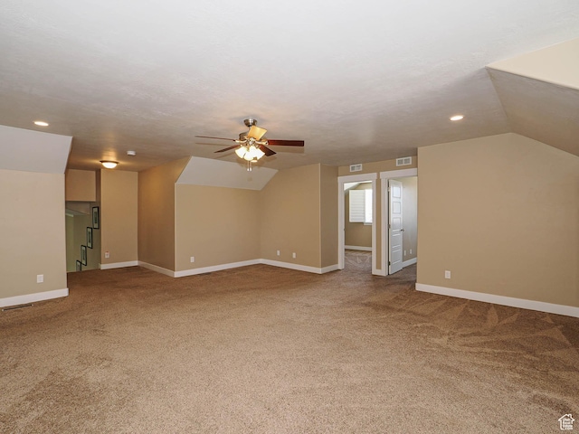7503 S Bridge Maple Ln, West Jordan, UT 84081 - additional living space with carpet flooring, ceiling fan, vaulted ceiling, baseboards, and recessed lighting