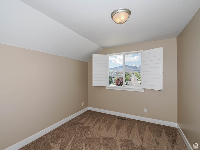 7503 S Bridge Maple Ln, West Jordan, UT 84081 - bonus room with carpet floors, baseboards, vaulted ceiling, and a mountain view