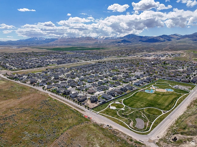 7503 S Bridge Maple Ln, West Jordan, UT 84081 - aerial perspective of suburban area with a mountainous background
