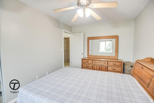 carpeted bedroom with a ceiling fan