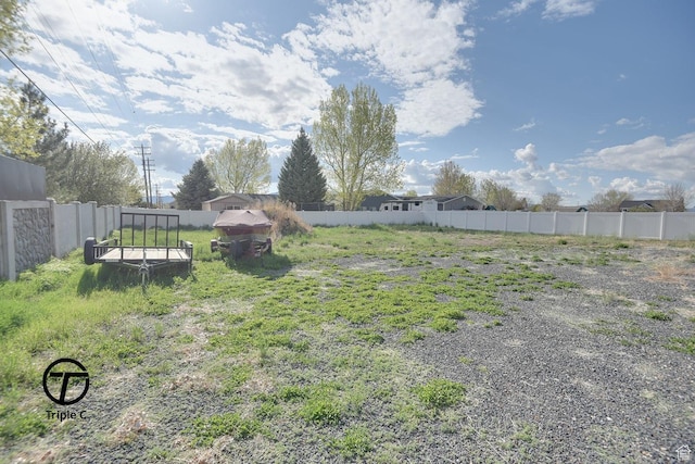 view of yard with fence