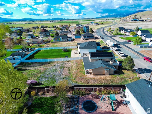 aerial view of residential area with mountains