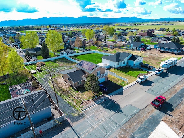 aerial view of residential area with a mountainous background