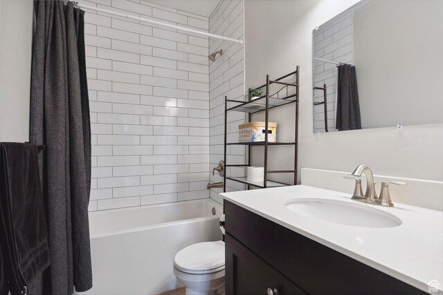 bathroom with toilet, shower / bath combo with shower curtain, and vanity