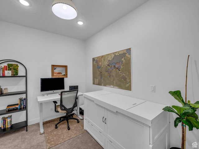 office with recessed lighting and baseboards