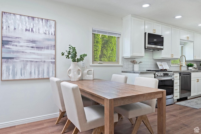 462 E 1700 S, Salt Lake City, UT 84115 - dining space with light wood-type flooring, recessed lighting, and baseboards
