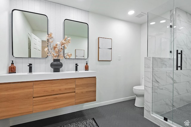 462 E 1700 S, Salt Lake City, UT 84115 - full bath with baseboards, toilet, a marble finish shower, double vanity, and recessed lighting