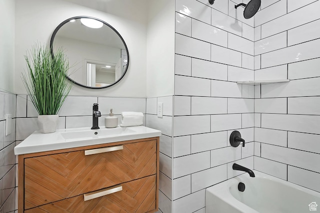 462 E 1700 S, Salt Lake City, UT 84115 - bathroom featuring tile walls, shower / tub combination, and vanity