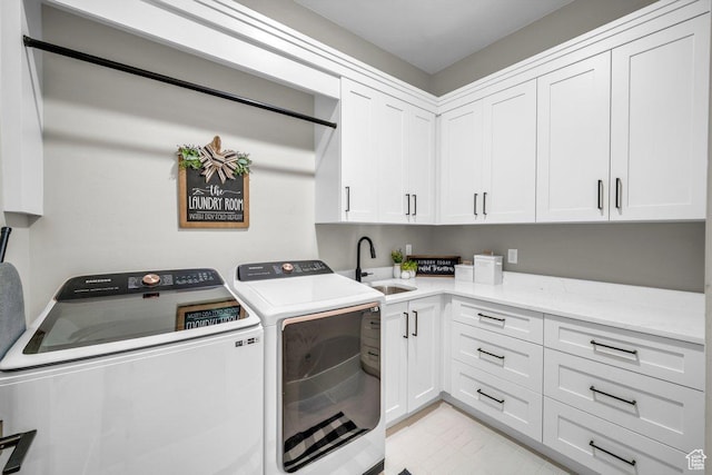762 E Arina Way, Washington, UT 84780 - laundry area featuring washer and dryer, cabinet space, and light tile patterned floors