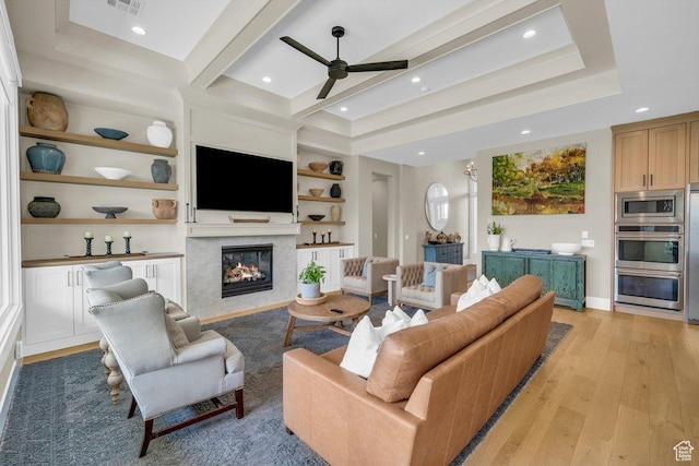 762 E Arina Way, Washington, UT 84780 - living room with light wood-type flooring, ceiling fan, a high end fireplace, built in features, and recessed lighting