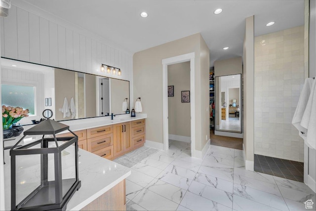 762 E Arina Way, Washington, UT 84780 - full bathroom featuring baseboards, vanity, a walk in closet, marble look tile flooring, and recessed lighting