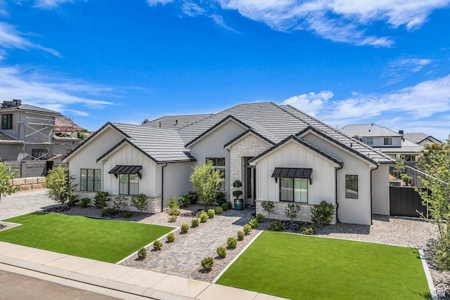 762 E Arina Way, Washington, UT 84780 - modern inspired farmhouse featuring stone siding, board and batten siding, stucco siding, and a tile roof