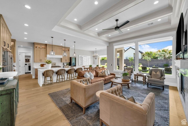 762 E Arina Way, Washington, UT 84780 - living room featuring healthy amount of natural light, ceiling fan, recessed lighting, light wood-style floors, and a premium fireplace